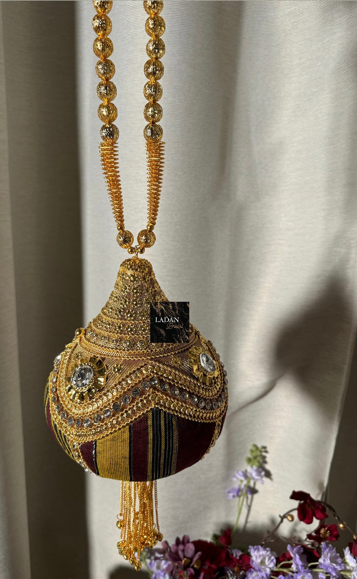 Hido iyo Dhaqan Gold bag | Maroon & Gold