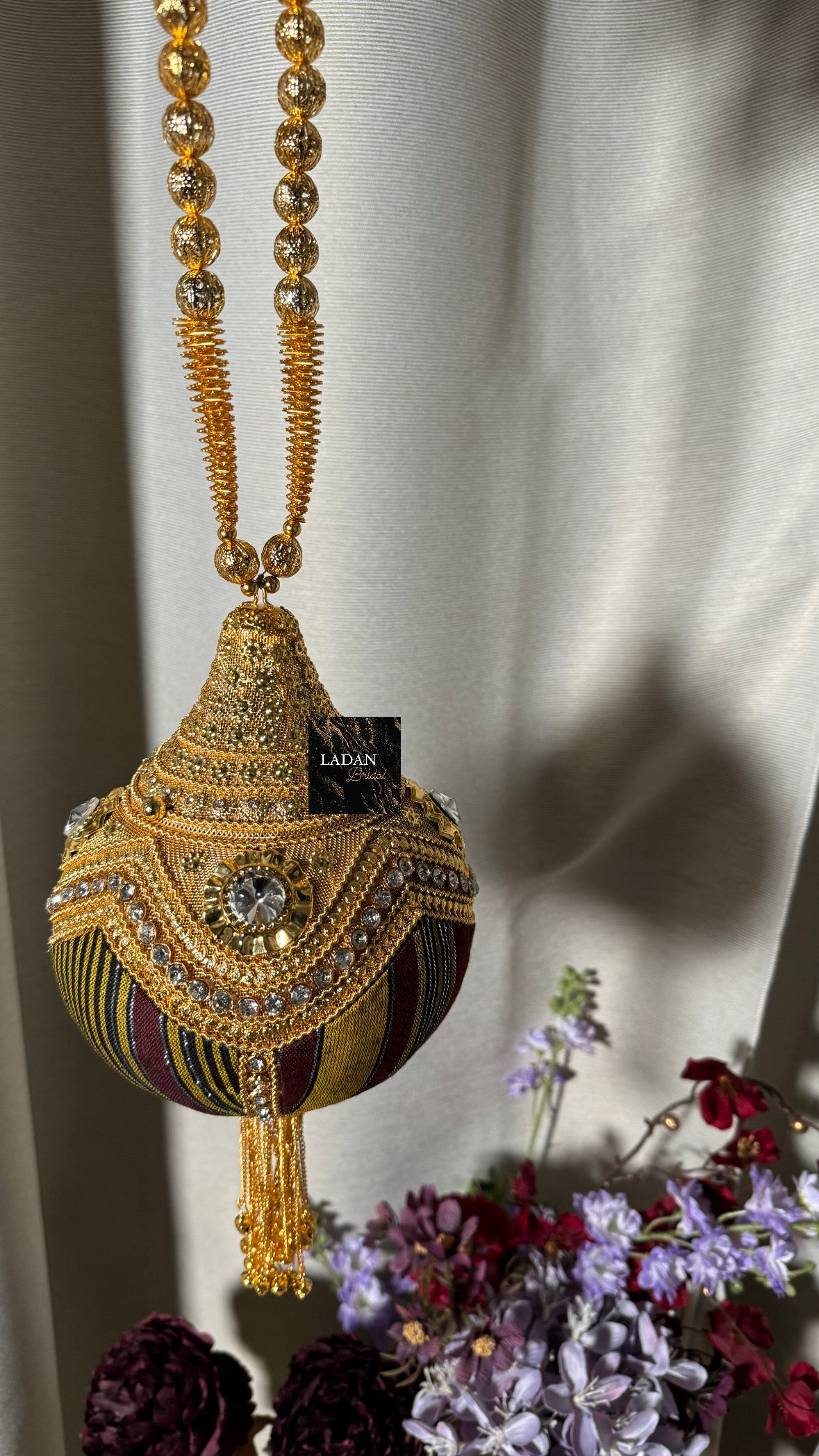 Hido iyo Dhaqan Gold bag | Maroon & Gold